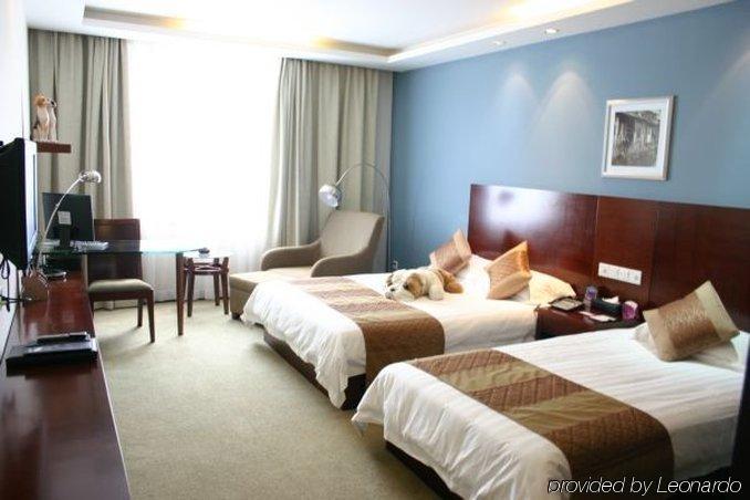 Suzhou Taoyuan International Holiday Hotel Oda fotoğraf